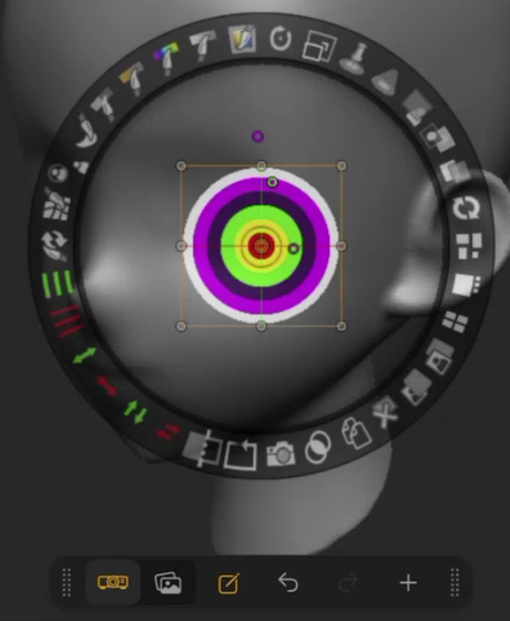 Spotlight in Edit Spotlight mode with the bull’s-eye texture, the Spotlight dial, and the Spotlight menu bar